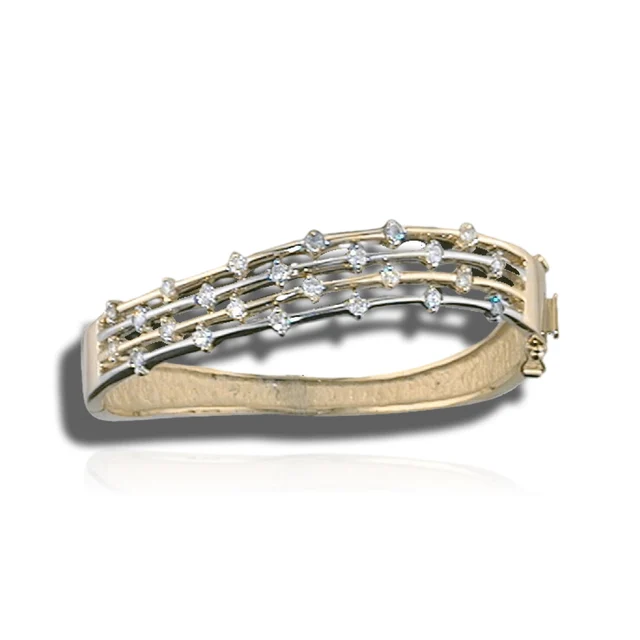 Hinged two-tone bangle with four slender, curved rails dotted with individually set round diamonds.