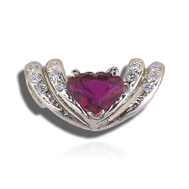 Heart-shaped red centre stone framed by paired, diamond-set curves.