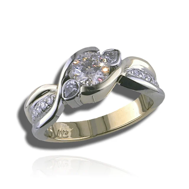 Round centre stone between curved two-tone shoulders and smaller stones in leaf-shaped settings.