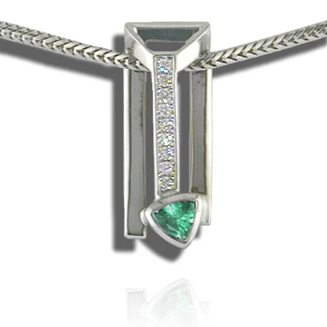 Open geometric pendant with a vertical diamond row and a triangular green stone at its base.