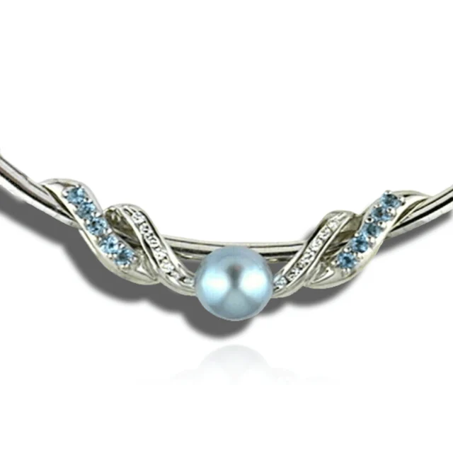 Curved necklace with a blue-grey pearl between sweeping rows of blue stones and diamonds.